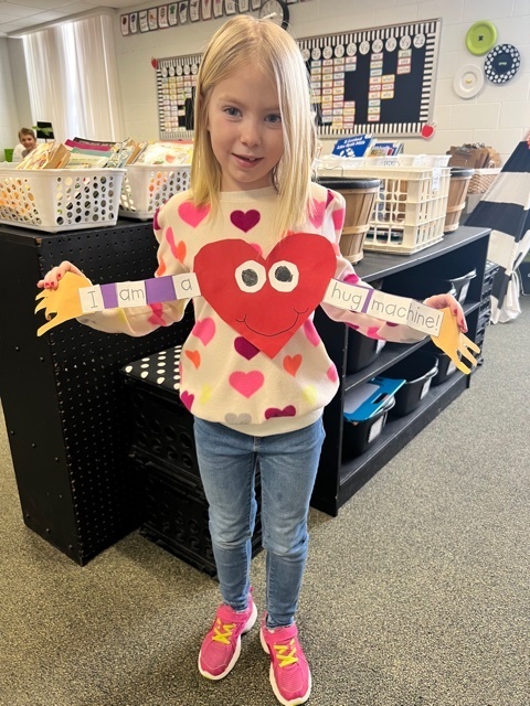 First Grade Student with a Hug Machine 