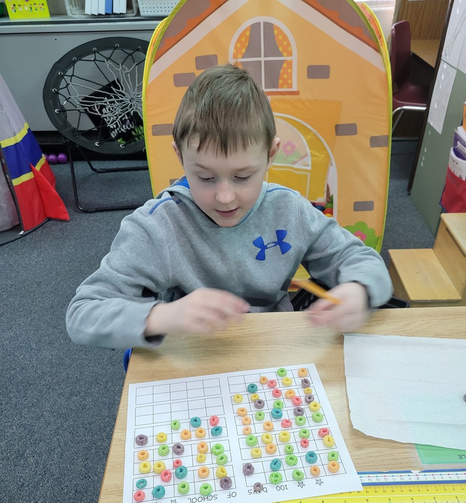 Student counting with cereal