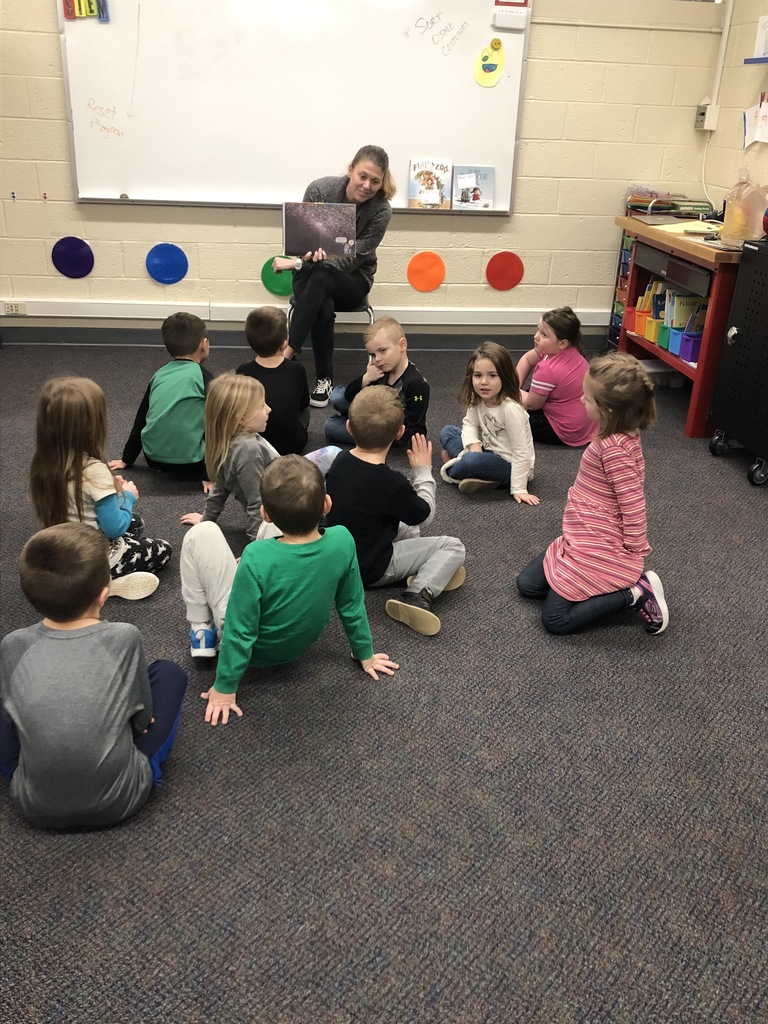 Students enjoying a read aloud with Mrs. Koehler.